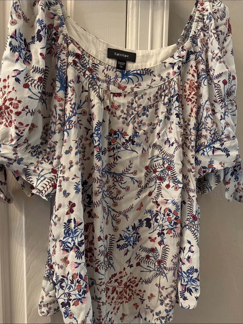 Karen Kane White Floral Puff-Sleeve Top with Blue and Rust Accents 1x.